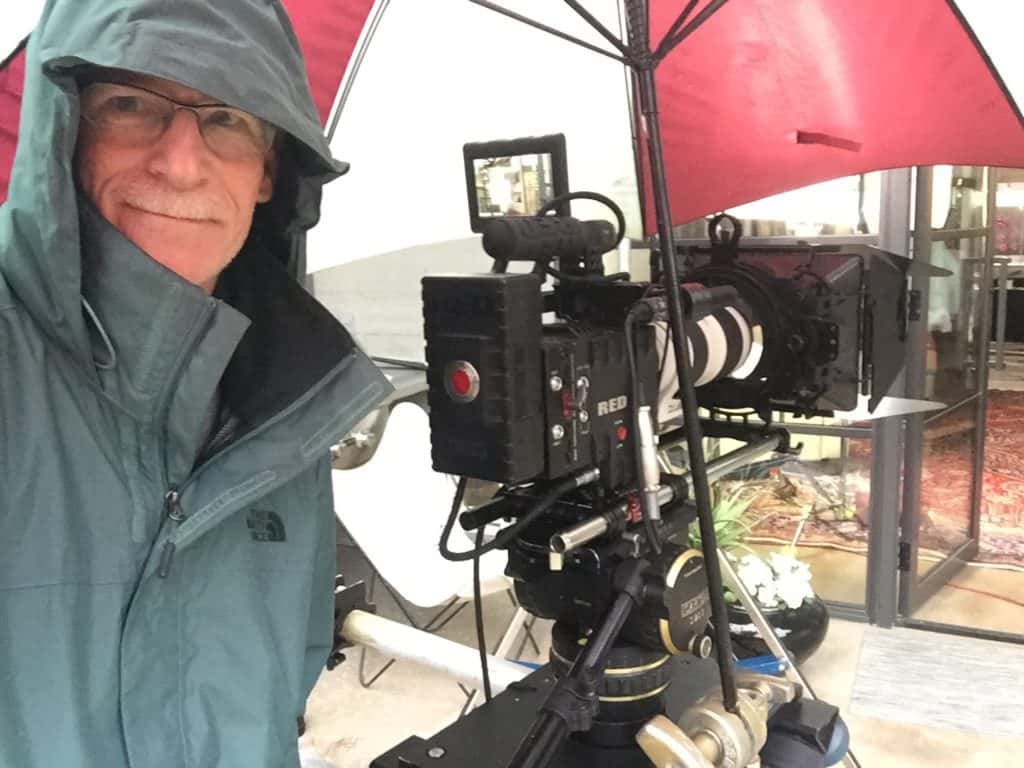 crm studios camera operator tom richards posing with video camera