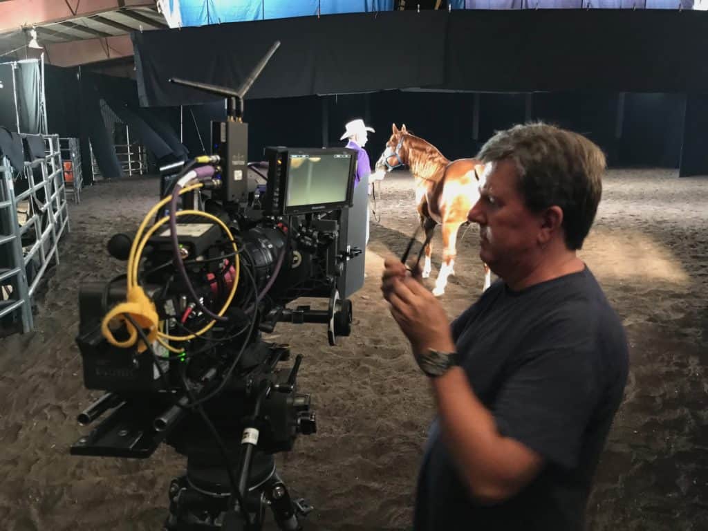 Man with Horse and Man with Video Camera